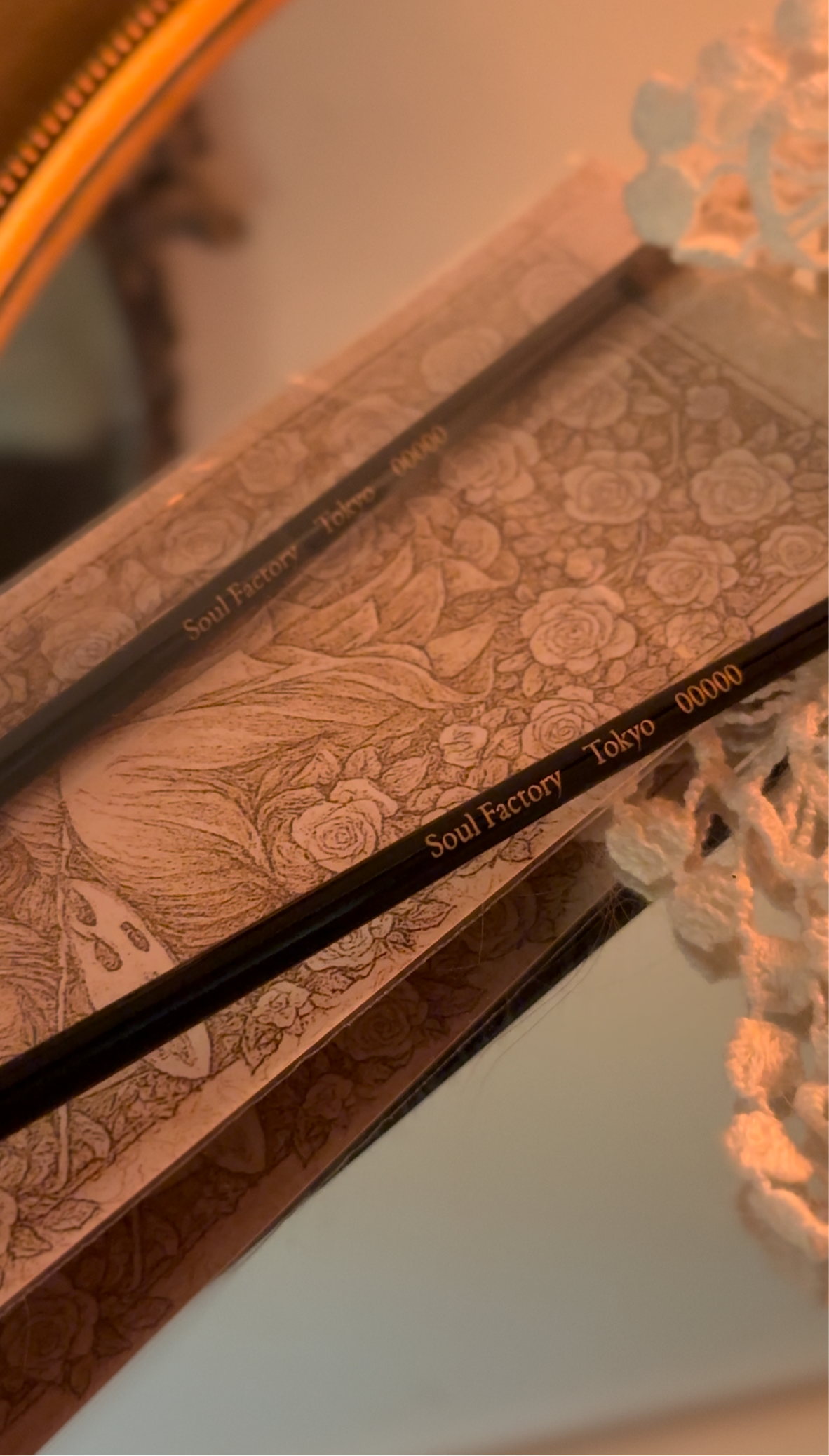 Handmade precision face-up brush for doll makeup with fine detailing, crafted by traditional artisans.